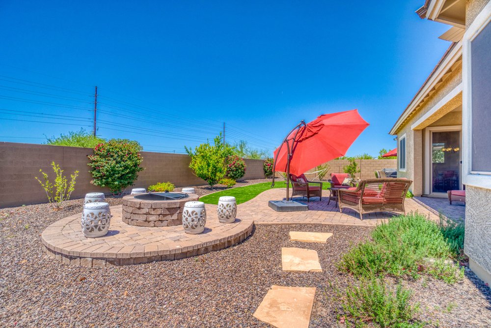 Creating Outdoor Living Spaces: Patios, Pergolas, and Fire Pits